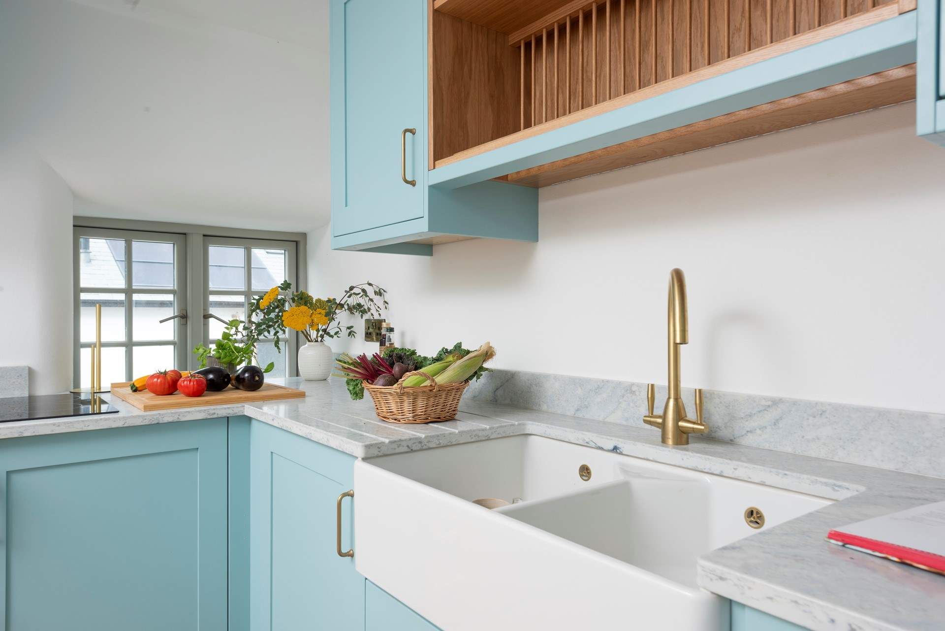 The Italian inspired draining board gives Tuscan farmhouse vibes.