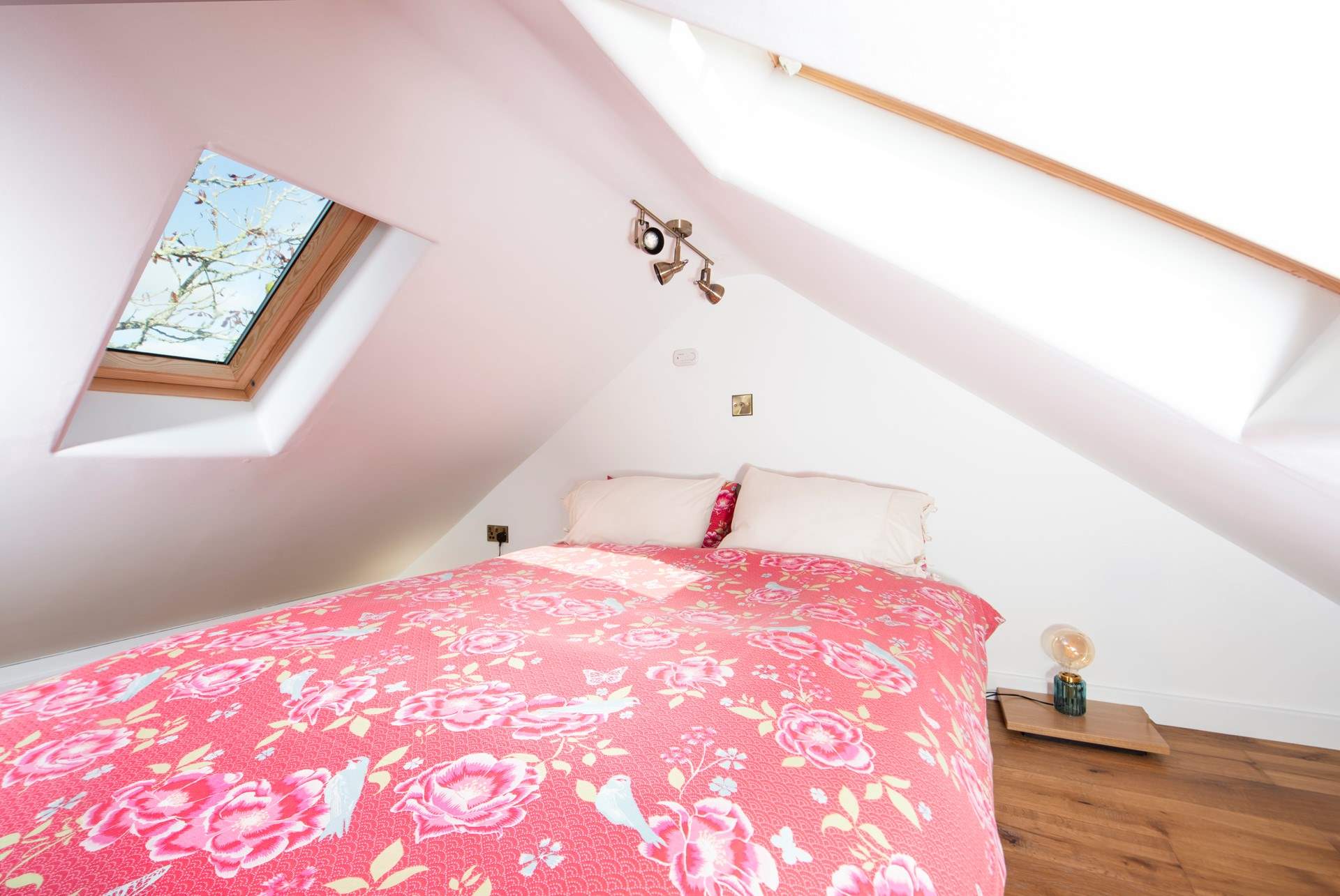 The ceiling is very low, you feel as if you are in the treetops. 