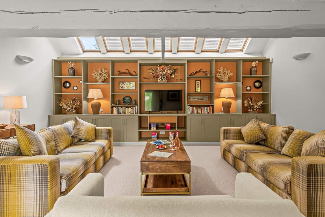 The sitting-room is the perfect space to relax and unwind after a long day of exploring your beautiful surroundings.