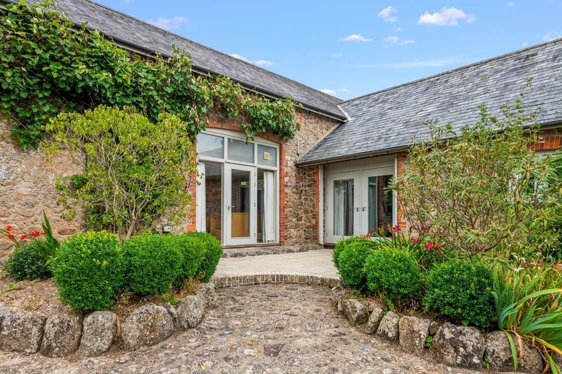 These doors lead out from the kitchen and living area. As they lead into the owners courtyard, for their privacy and yours, please only use these doors to exit the cottage in an emergency.