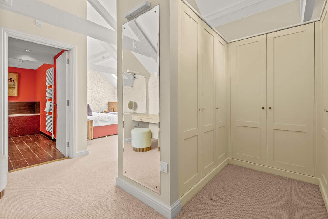 Bedroom 2 even offers a large dressing-area.