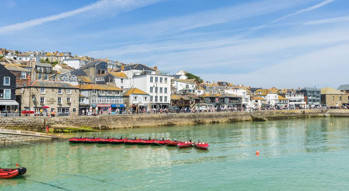 Take a day trip to St Ives, shimmering turquoise waters, local cafes and galleries, don't forget to visit The Tate!