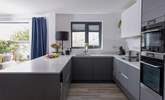 Cook up a feast in the modern very well-equipped kitchen. - Thumbnail Image