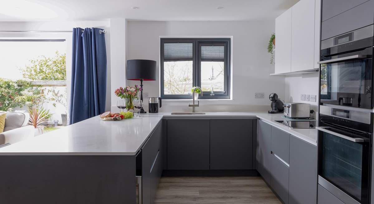 Cook up a feast in the modern very well-equipped kitchen.