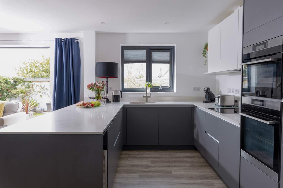 Cook up a feast in the modern very well-equipped kitchen.