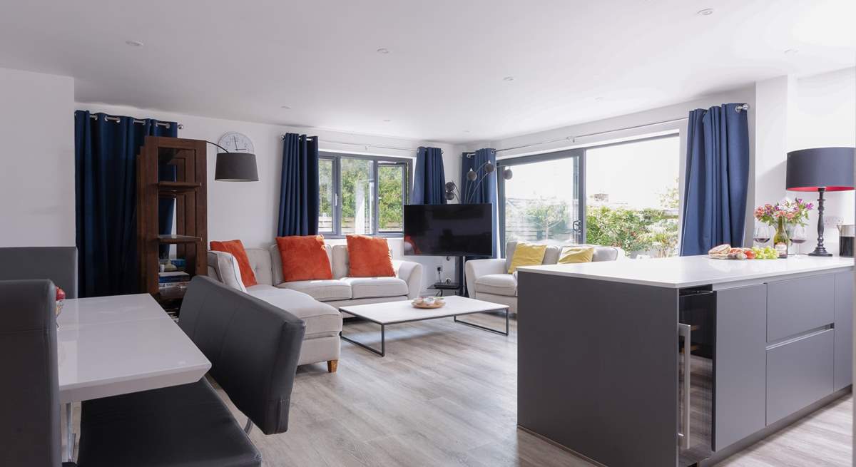 Seamless indoor/outdoor living, throw open the doors to the sweet garden.