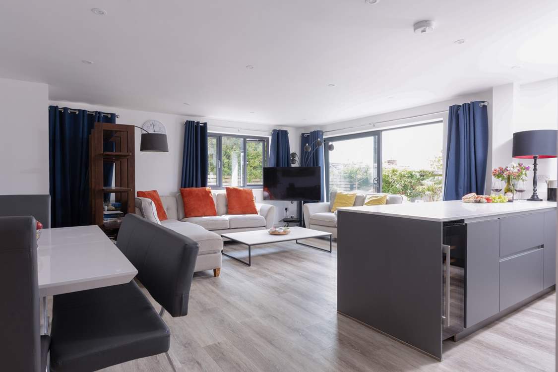 Seamless indoor/outdoor living, throw open the doors to the sweet garden.