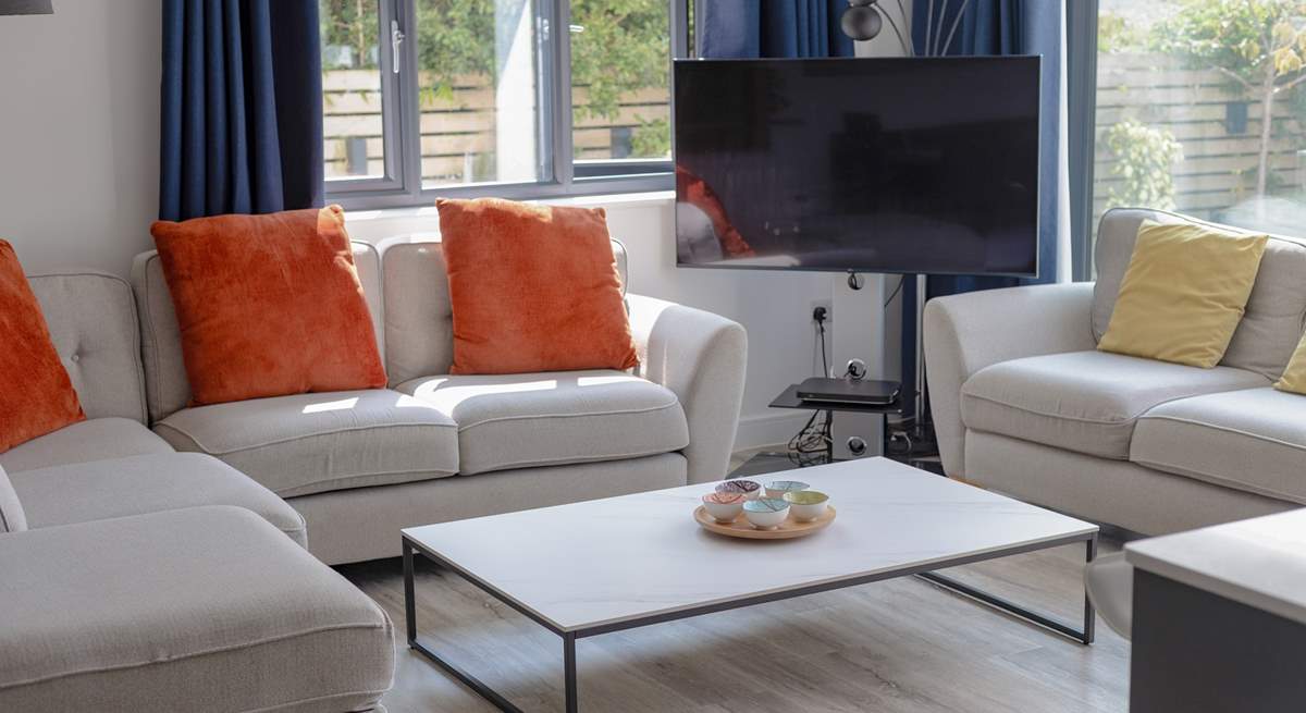 Sit back, unwind and enjoy the Smart TV from the comfort of the sofa.
