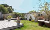 Outdoor living made easy, comfortable rattan seating and the beach on your doorstep. - Thumbnail Image