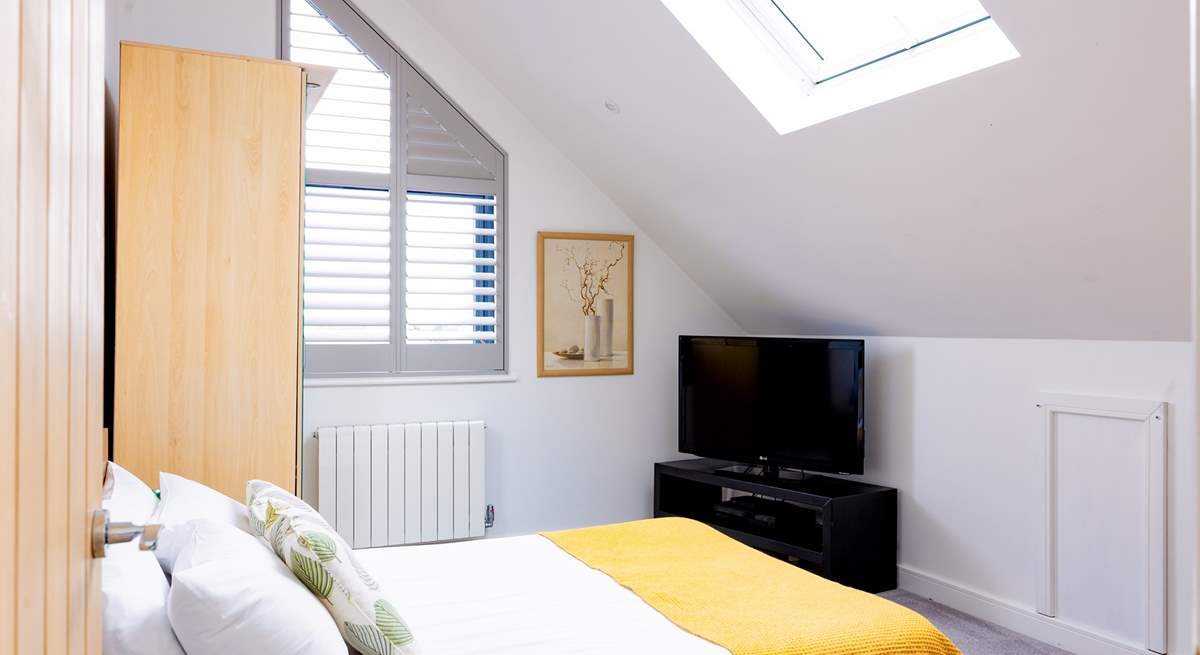 Bedroom 4 has a double bed and views of Praa Sands below.