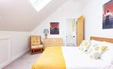 Bedroom 4 is filled with light and has distant sea views. - Thumbnail Image