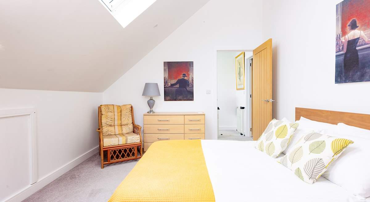 Bedroom 4 is filled with light and has distant sea views.