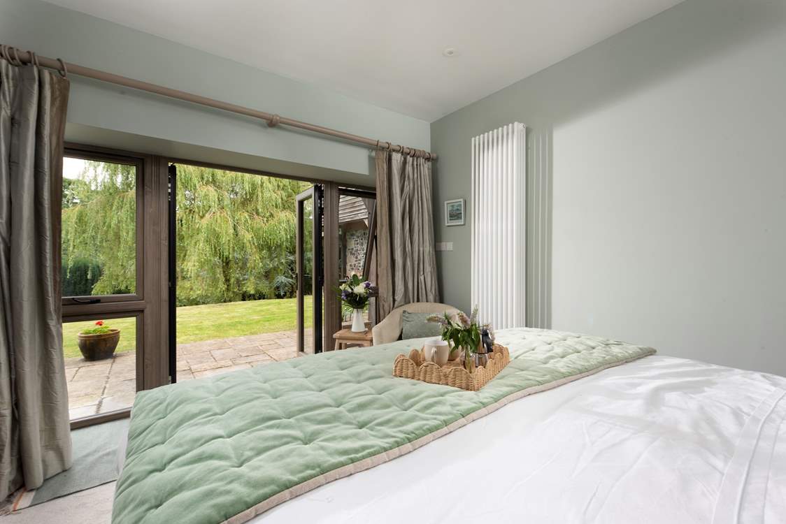 There are large double doors to access the garden.
