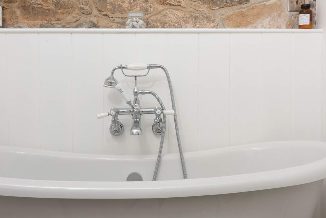 And a separate roll-top bath for luxurious soaks.