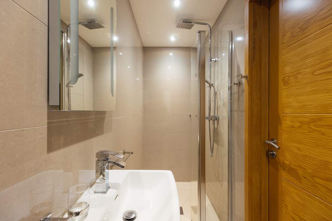 Superb bath/shower rooms throughout.