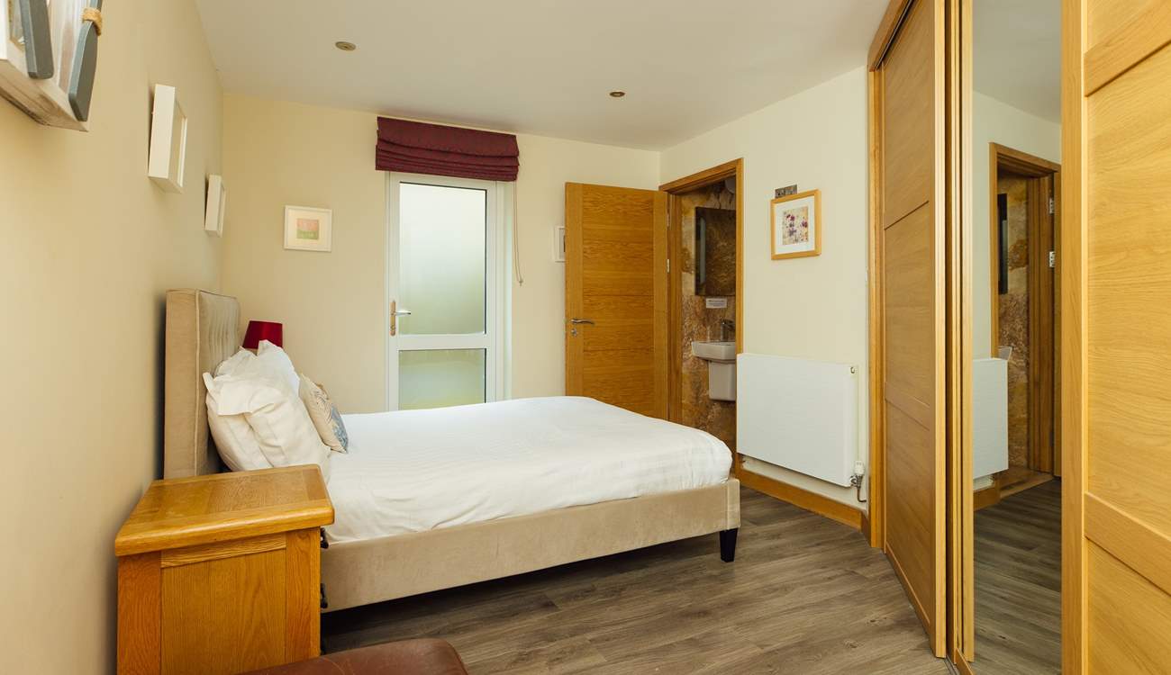 Ground floor double en suite room with garden access. 