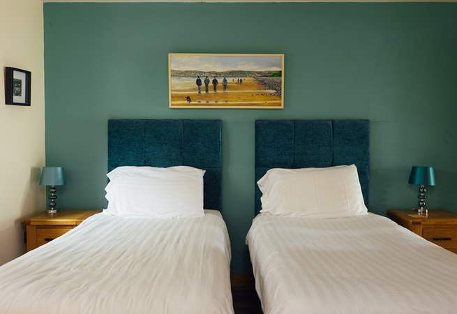 Garden facing en suite twin room which may be made up as a king bed on request. 