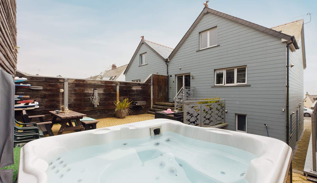 Perfect at anytime of the day, relax in the heavenly hot tub. 