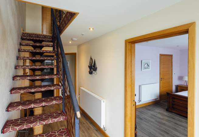 Take care on the open-tread staircase. 