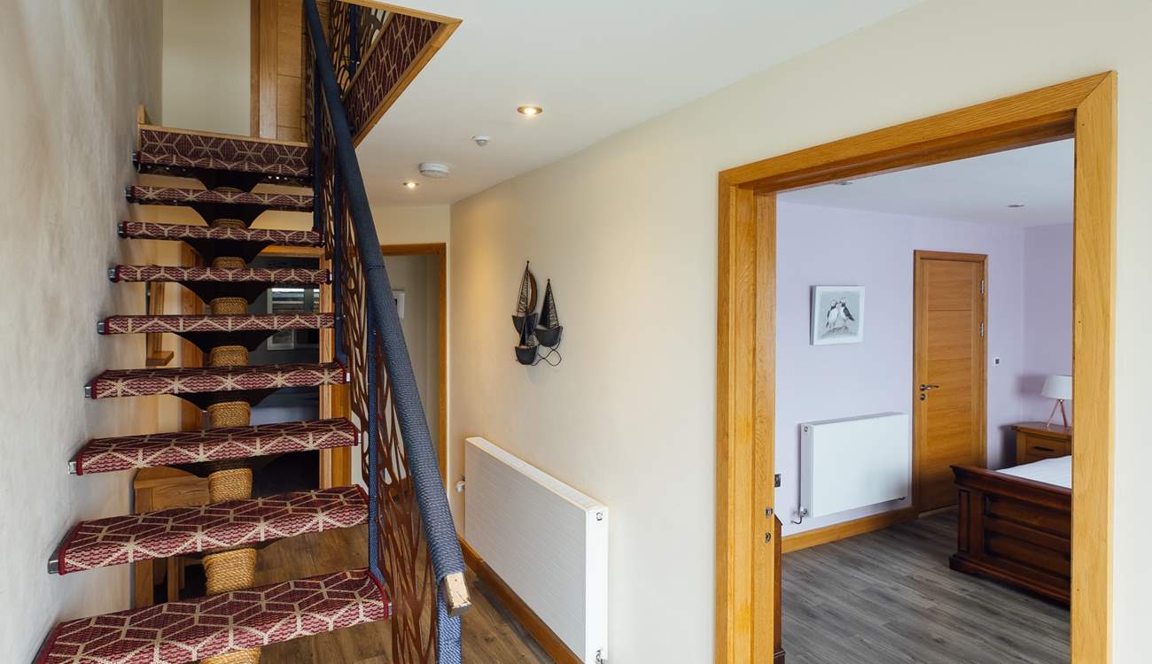 Take care on the open-tread staircase. 