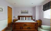You'll find a super-king, a double and a twin en suite bedroom on the ground floor.  - Thumbnail Image