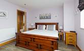 With a view to the front, the gorgeous super-king en suite on the ground floor.  - Thumbnail Image