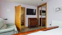 Relax on the sofa in the super-king room and enjoy a movie