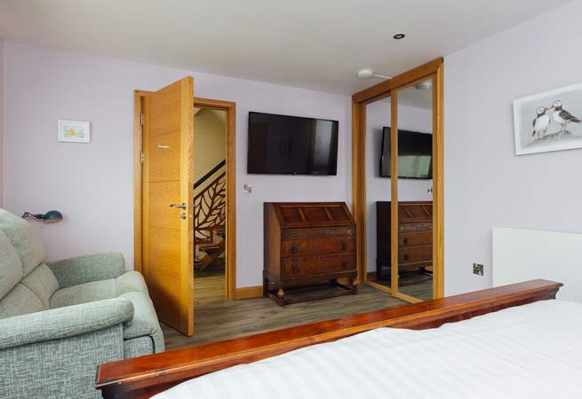 Relax on the sofa in the super-king room and enjoy a movie