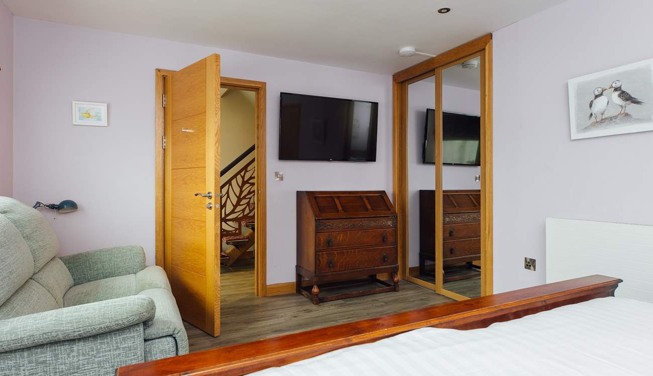 Relax on the sofa in the super-king room and enjoy a movie