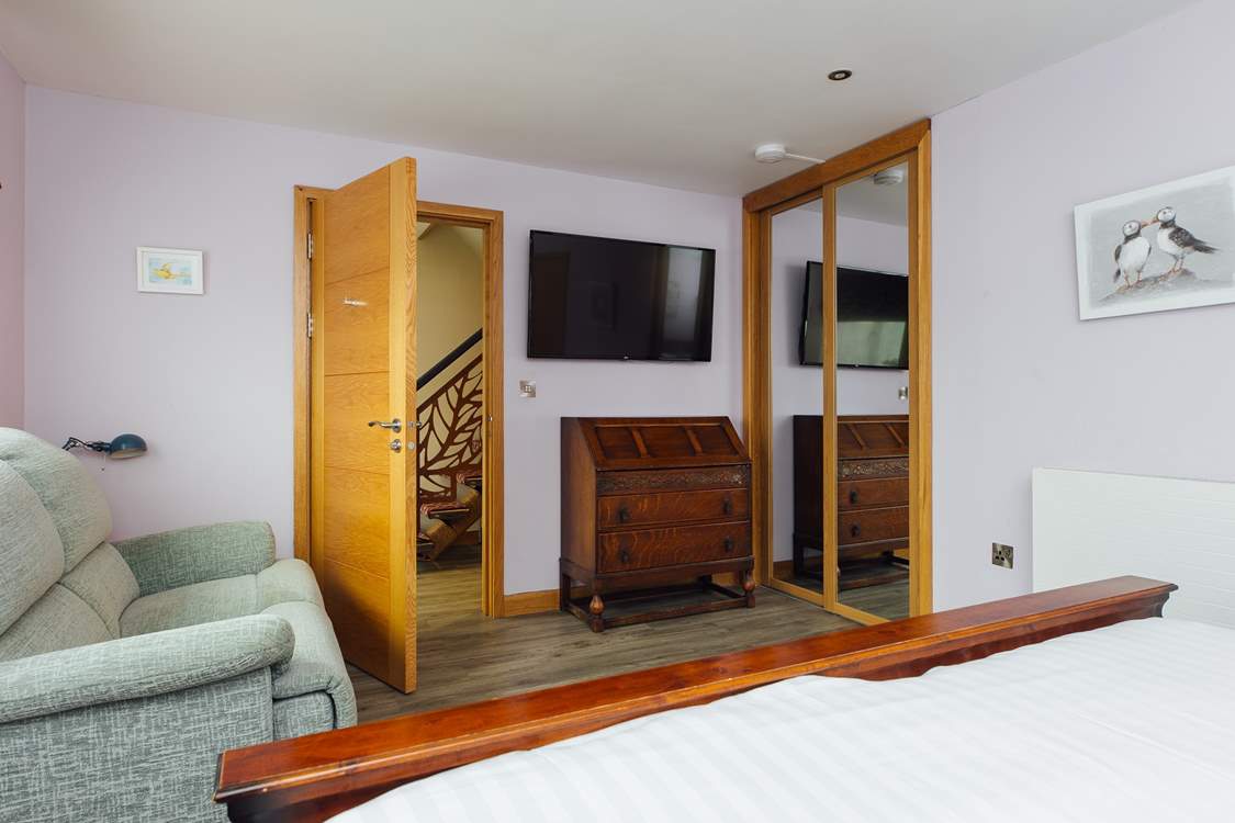 Relax on the sofa in the super-king room and enjoy a movie