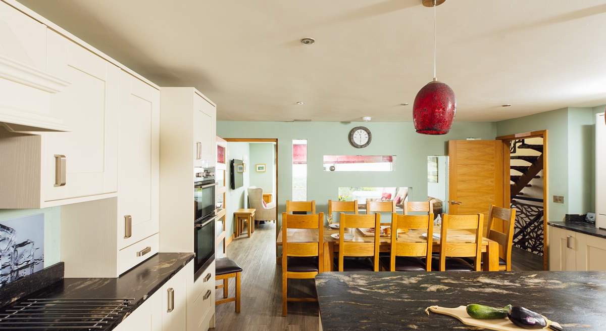 Plenty of room for everyone in the open plan kitchen/dining area with access to the rear garden.