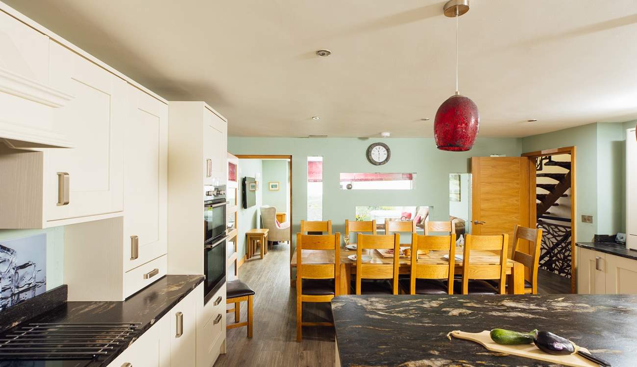 Plenty of room for everyone in the open plan kitchen/dining area with access to the rear garden.