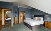Spacious principal bedroom with luxurious bathroom and spectacular views across St Brides Bay. (Shared en suite, with doors from the principal and twin room on the second floor).  - Thumbnail Image