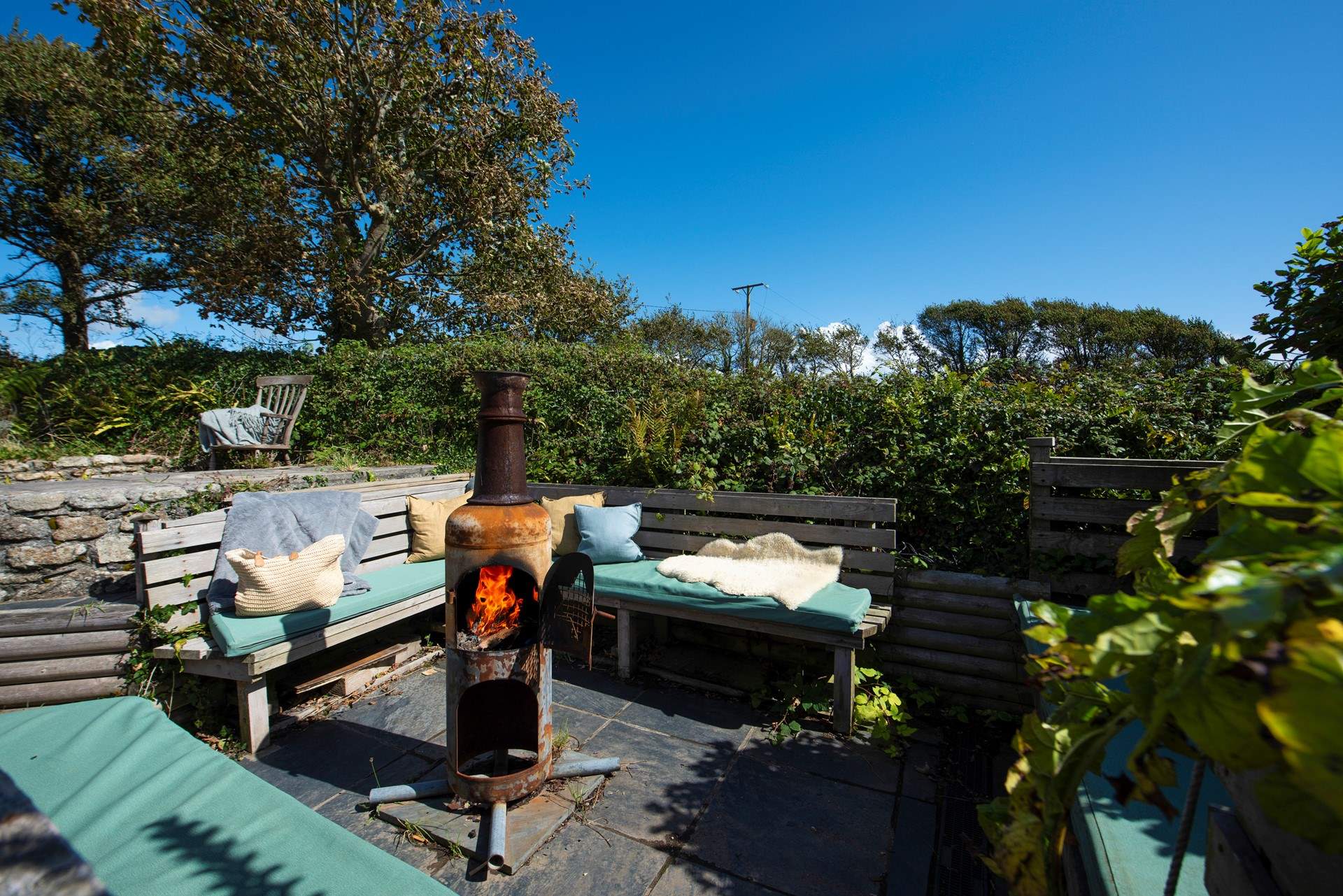 The rustic chiminea and lounge area is perfect for stargazing.