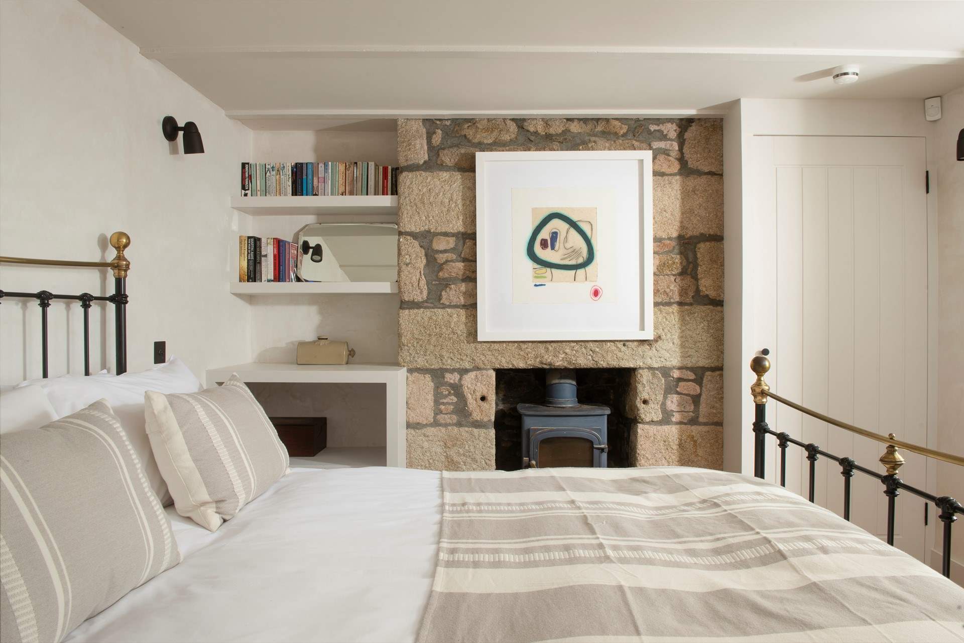 Beautiful bedroom 1 has a wood-burner.