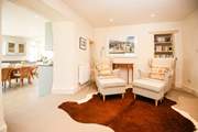 Leading off the kitchen-area is this charming snug area. Perfect for relaxing in with a good book.