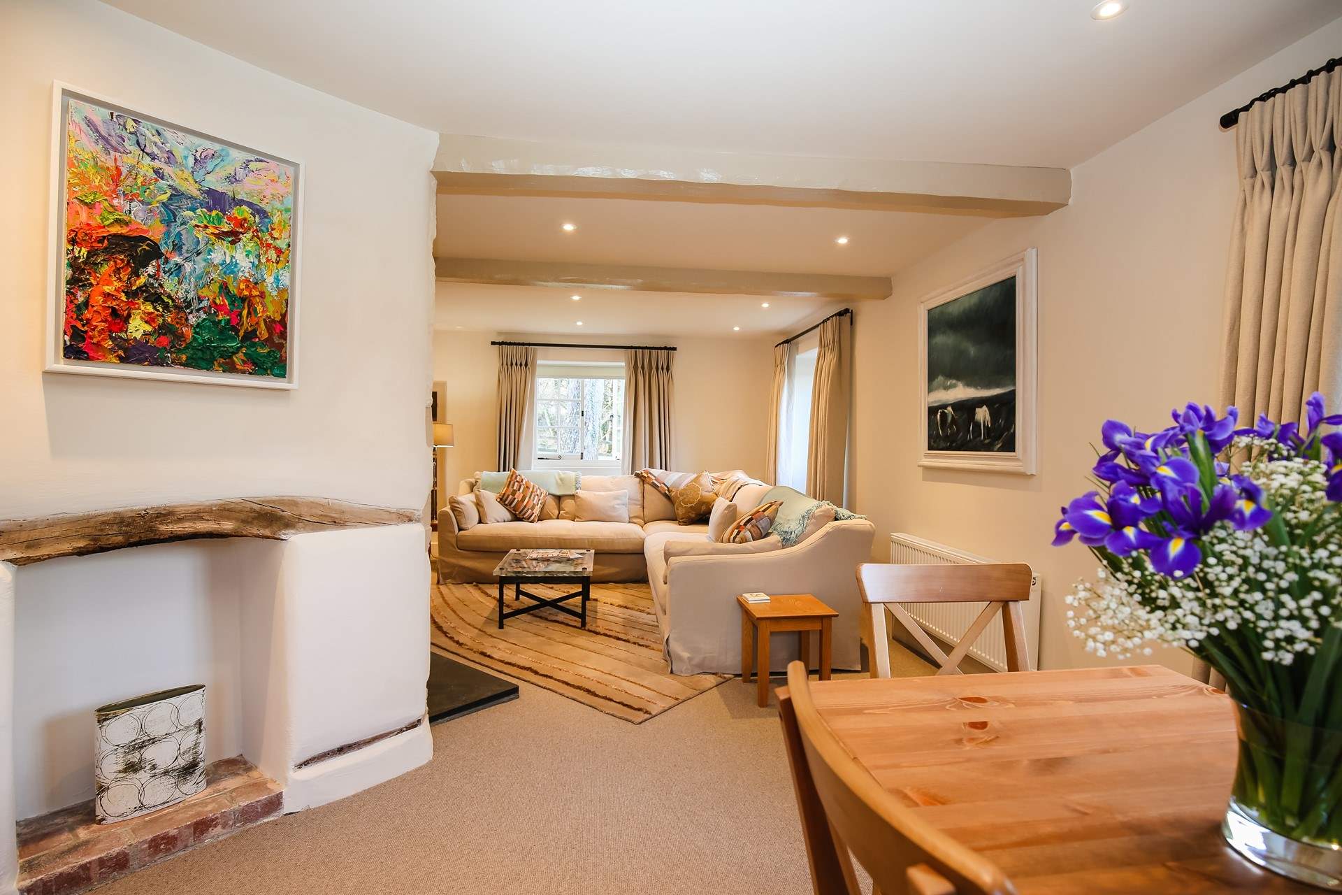 The dining-area leads neatly into the main sitting-area.