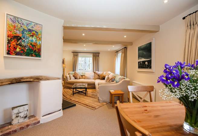 The dining-area leads neatly into the main sitting-area.