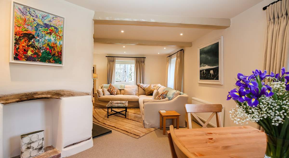 The dining-area leads neatly into the main sitting-area.