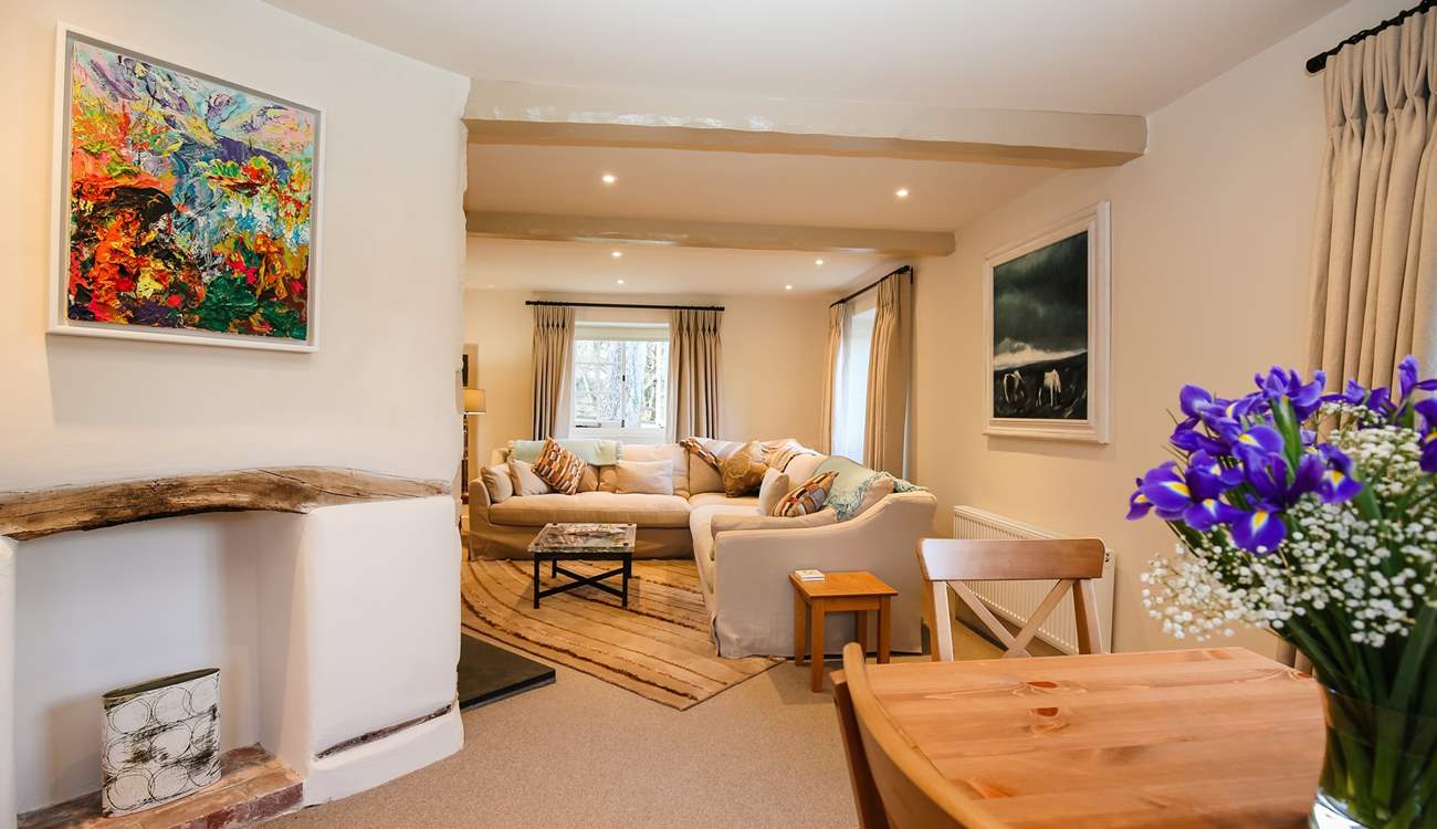 The dining-area leads neatly into the main sitting-area.