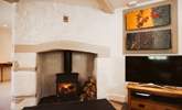 The glowing wood-burner is such a great feature on those chillier evenings. - Thumbnail Image