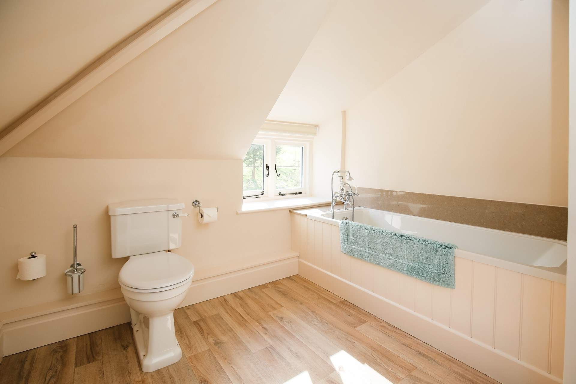 The family bathroom is rather spacious. Perfect for bathing the little ones. 