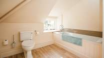 The family bathroom is rather spacious. Perfect for bathing the little ones. 