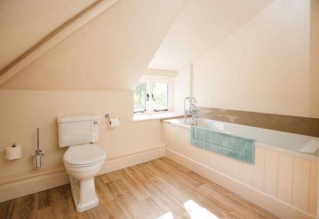 The family bathroom is rather spacious. Perfect for bathing the little ones. 