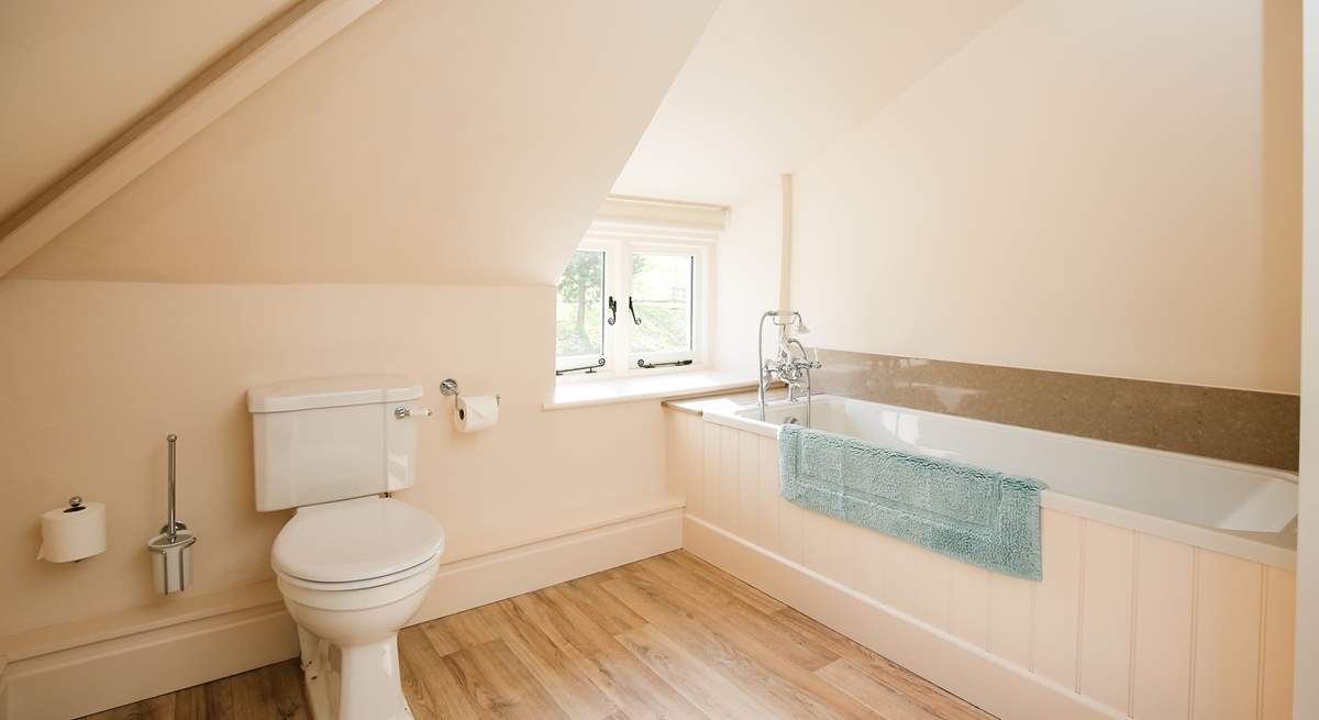 The family bathroom is rather spacious. Perfect for bathing the little ones. 