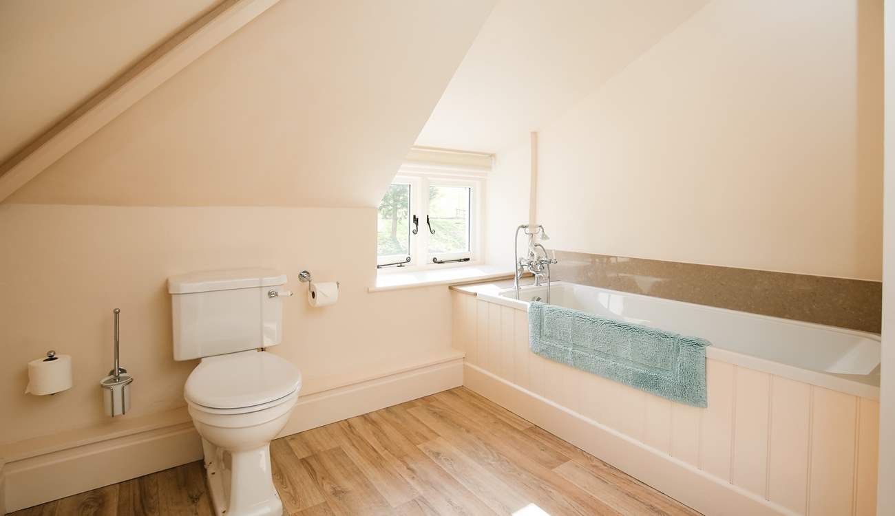 The family bathroom is rather spacious. Perfect for bathing the little ones. 