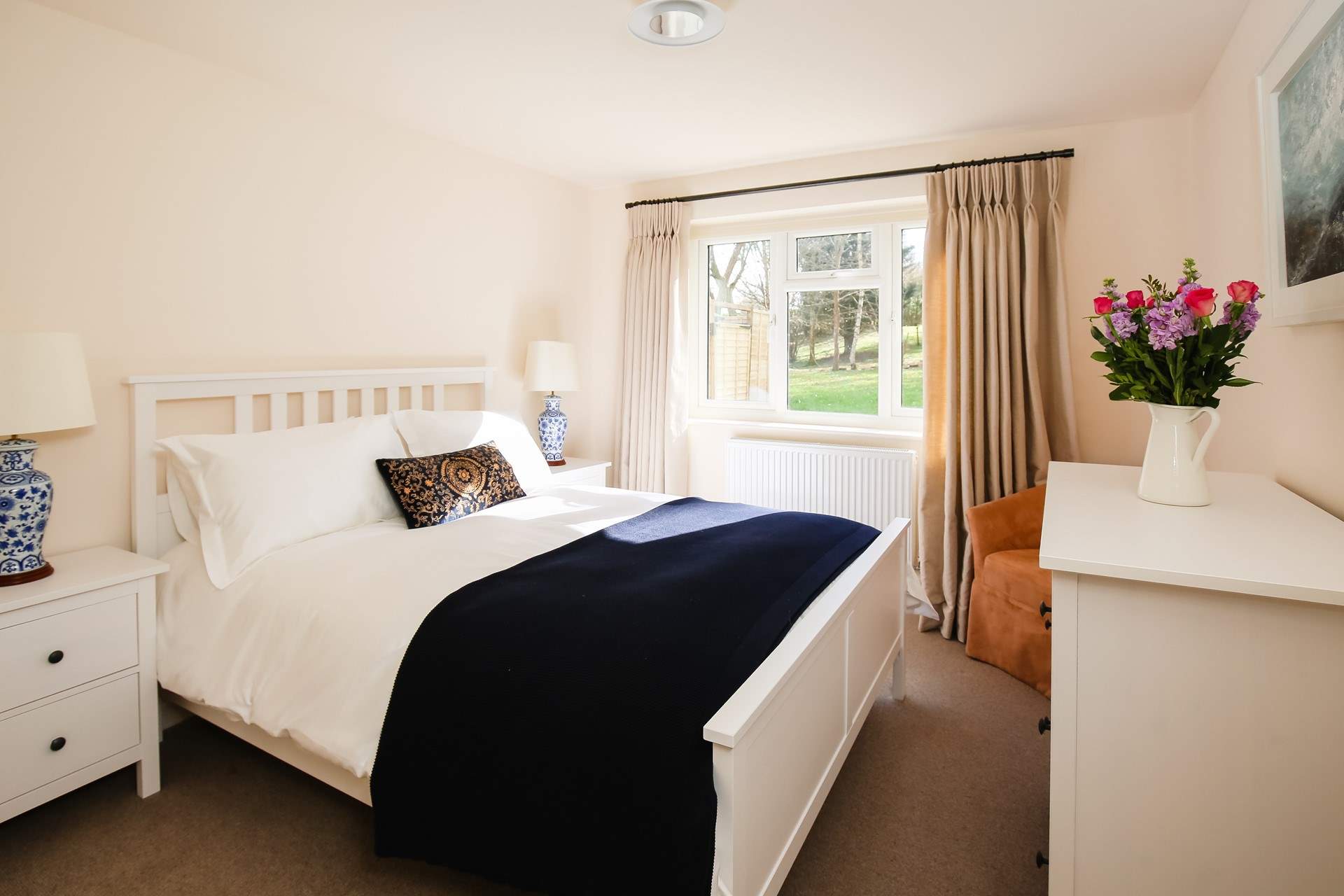 Bedroom 1 is home to this king-size bed and wonderful countryside views.