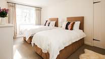 Bedroom 2 offers this sumptuous twin bed set-up.