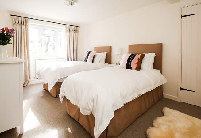 Bedroom 2 offers this sumptuous twin bed set-up.