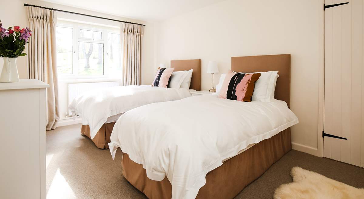 Bedroom 2 offers this sumptuous twin bed set-up.